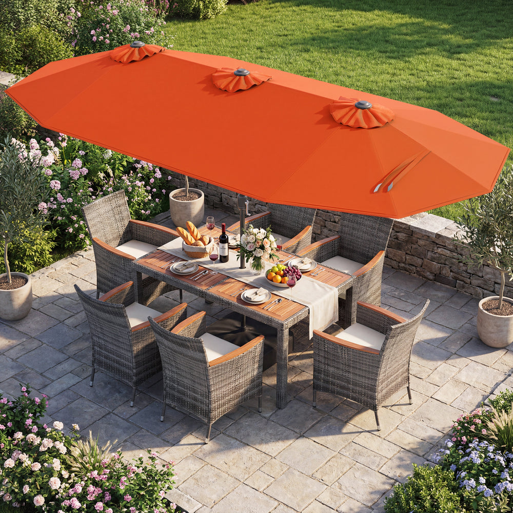 8-piece patio dining set featuring an orange double-sided umbrella, acacia wood table, and rattan chairs for outdoor.