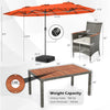 Detail shot of the orange double-sided market umbrella, showcasing its ventilated canopy and sturdy frame for outdoor.
