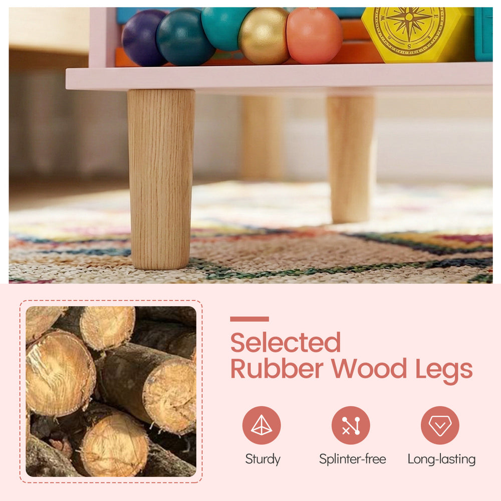 Selected rubber wood legs of the pink toddler scalloped side table, providing sturdy support for kids' storage needs.