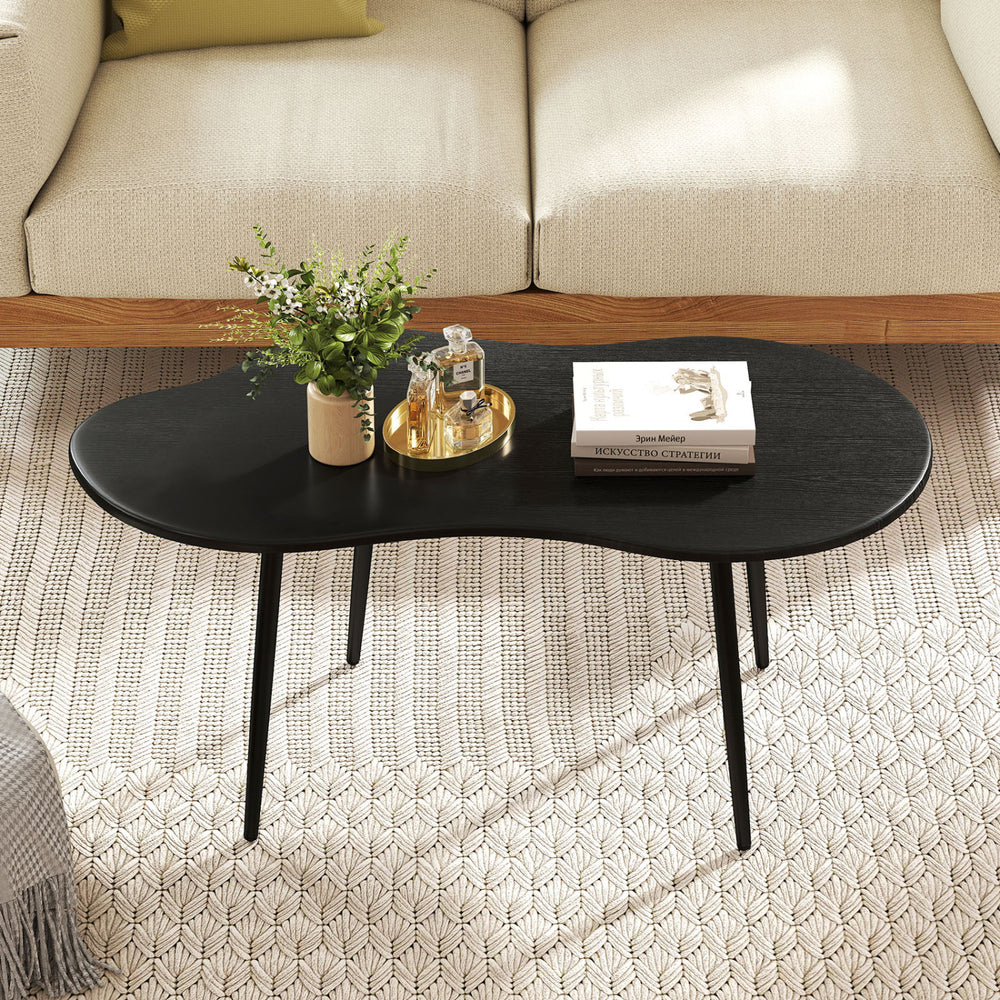 Cloud shape coffee table with a black metal frame and wide tabletop, perfect for living room or office use.