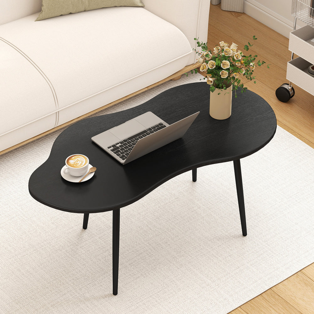 Cloud shape coffee table from a top view, showcasing its unique design and smooth surface, perfect for modern living.