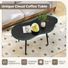 Cloud shape coffee table with black finish and metal frame, featuring a wide tabletop for living room or office use.