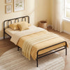 Twin foldable metal bed frame in black with arched headboard and footboard, perfect for space-saving bedroom solutions.