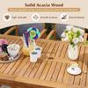 Close-up of the solid acacia wood tabletop of a 9-piece expandable patio dining set, showcasing its smooth surface and.