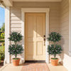 Set of 2 faux bush plants with vibrant flowers in cement-filled pots, perfect for enhancing front porch decor.