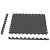 Interlocking 12-piece exercise mat in black with leaf anti-slip pattern, ideal for safe and organized training areas.
