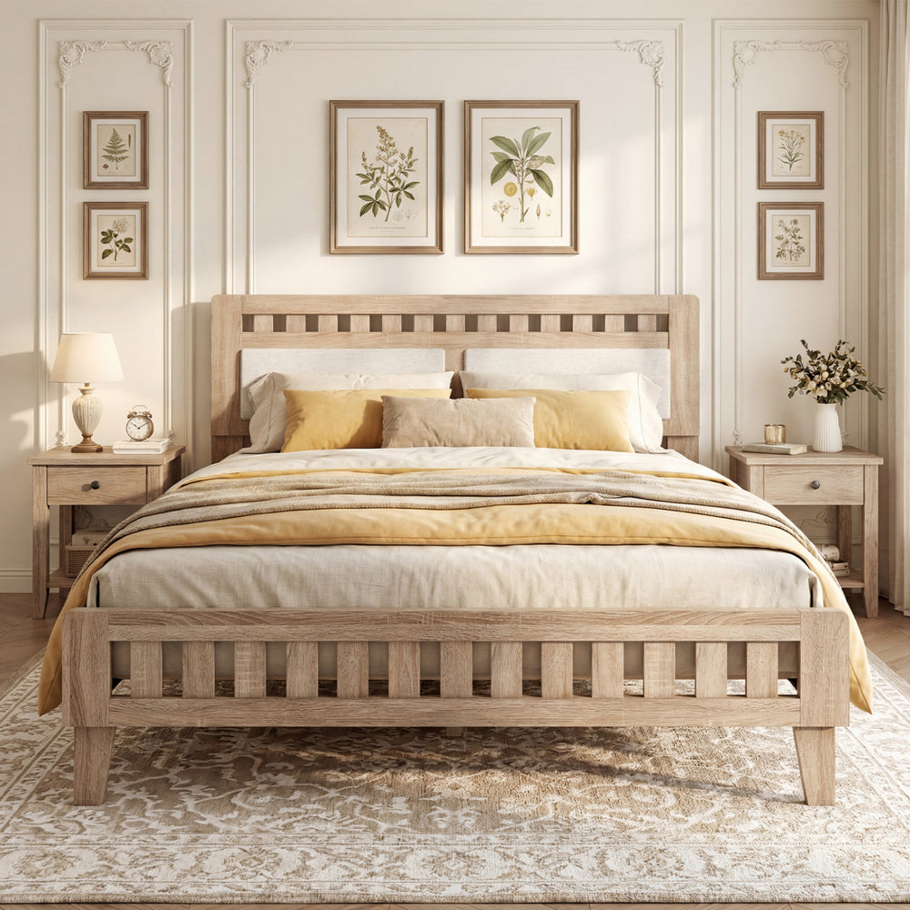 Queen wood bed frame with upholstered headboard in natural finish, styled with yellow bedding in a cozy bedroom setting.