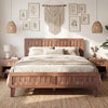 Mid Century queen size bed frame with woven accent headboard in natural finish, styled in a cozy bedroom setting.