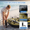 Man using a manual pump to inflate a green inflatable boat with Boston valves, ideal for fishing trips.
