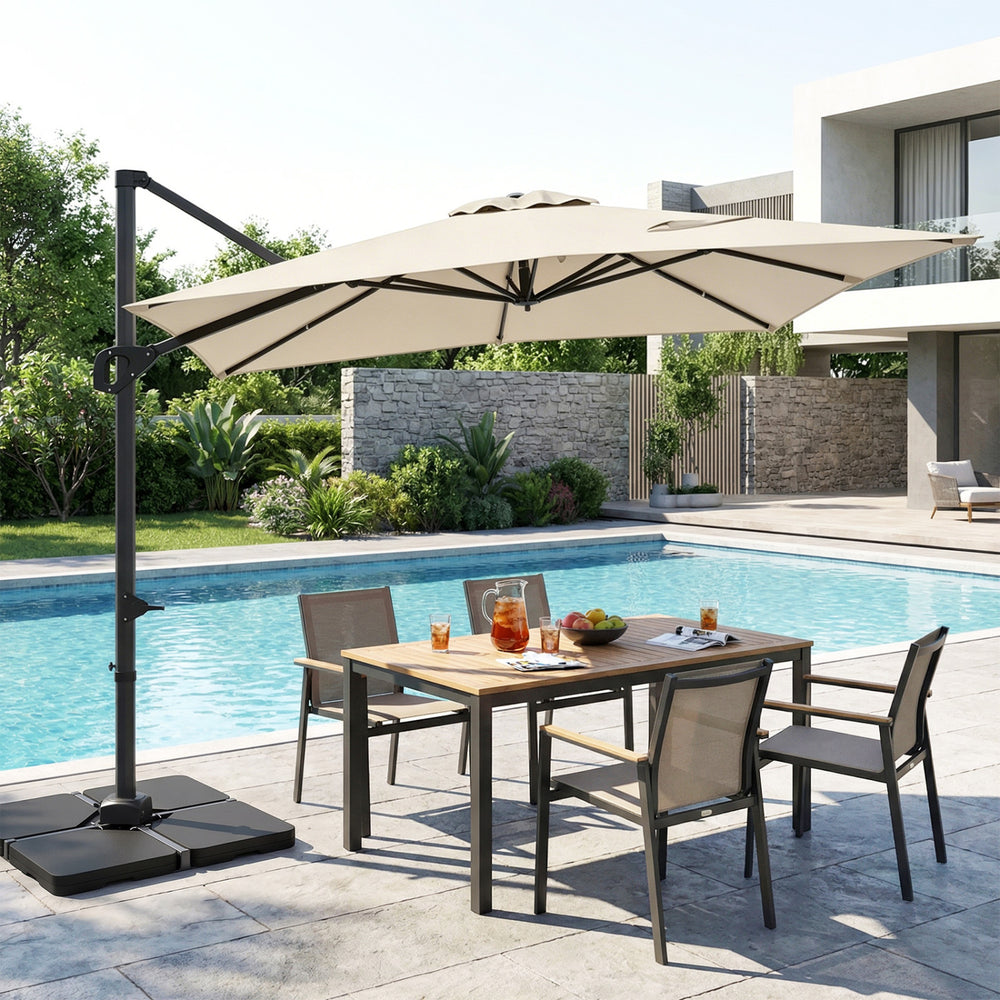 Beige 11 x 9 FT outdoor offset hanging umbrella with aluminum pole, rotating 360°, by the poolside dining set.