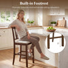 Counter height bar stool with contoured V-back and built-in footrest for enhanced sitting relaxation in a kitchen.