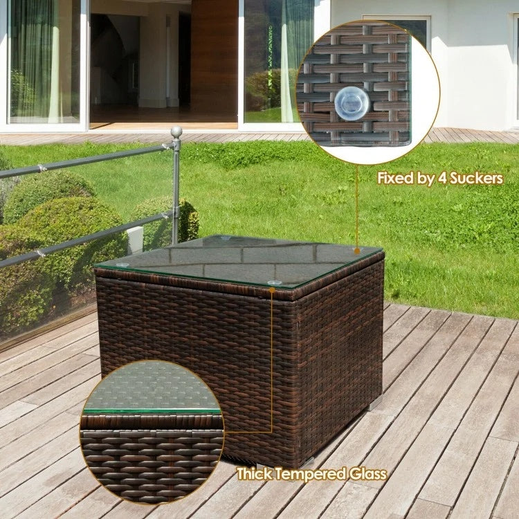 Square coffee table featuring thick tempered glass and rattan weave, secured with suckers for outdoor patio use.