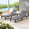Set of 2 gray outdoor chaise lounge chairs with adjustable backrests, perfect for patio or poolside relaxation.