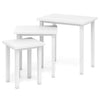 Stackable white side tables with sturdy wood tops, perfect for flexible storage and versatile use in any space.