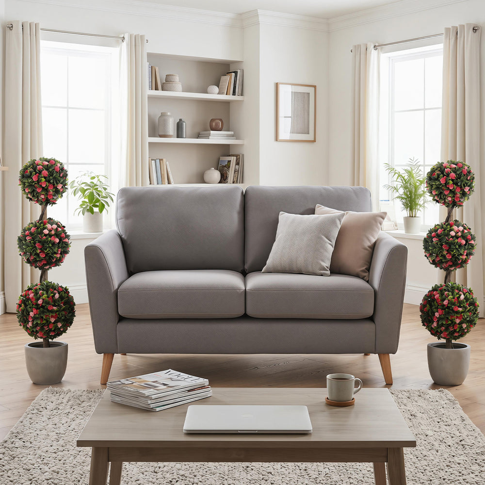 Triple-ball artificial rose topiary tree with lifelike blooms and green leaves, perfect for indoor or outdoor.