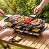Table grill and griddle with reversible nonstick plate, ideal for 8, featuring efficient heating and 8 cheese pans for gatherings.