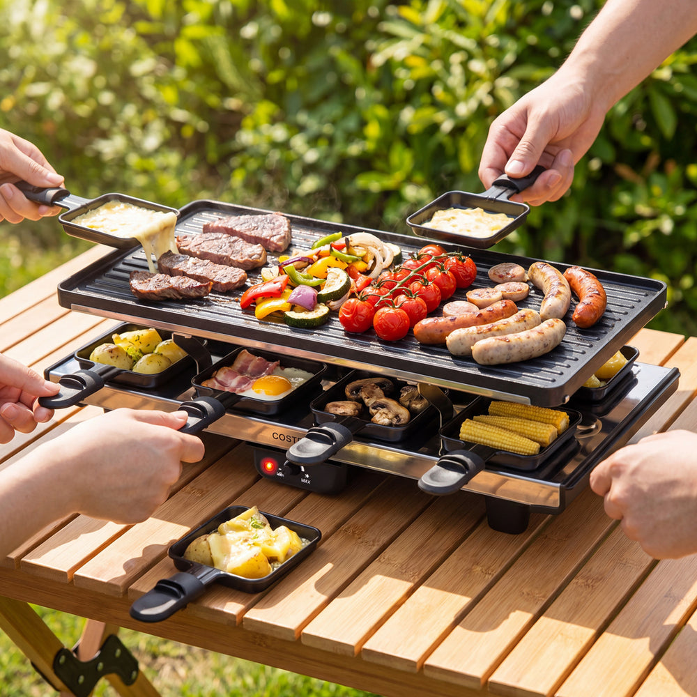 Table grill and griddle with reversible nonstick plate, ideal for 8, featuring efficient heating and 8 cheese pans for gatherings.