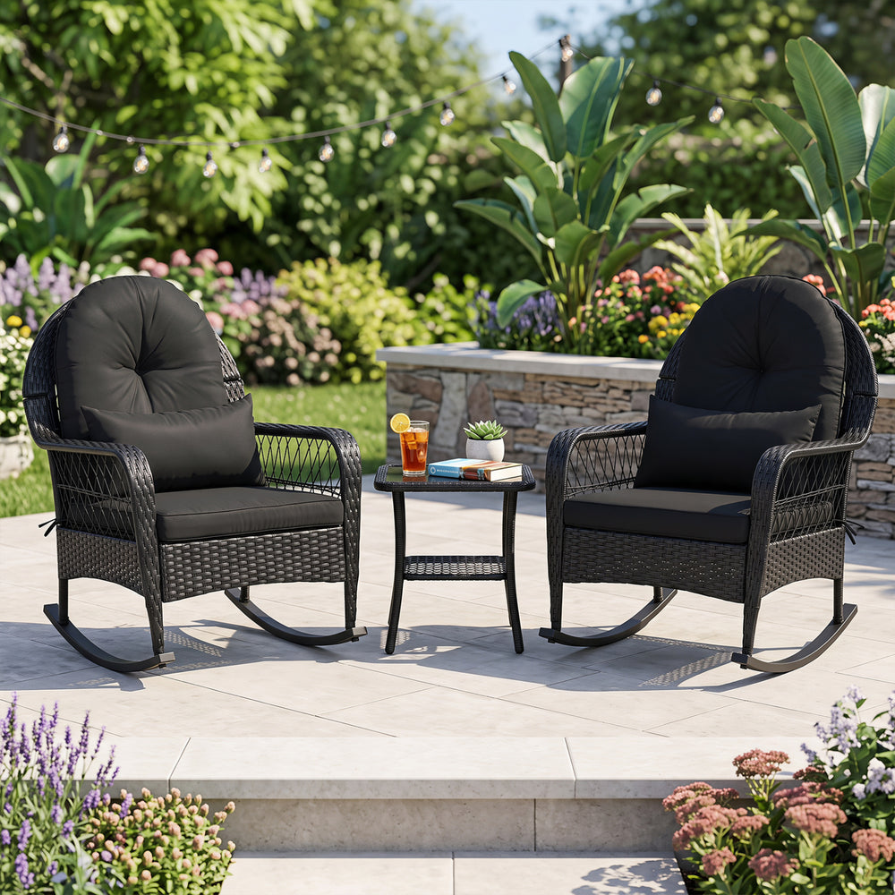 Black outdoor wicker rocking chairs with thick cushions, featuring anti-tip stoppers, perfect for porch relaxation.