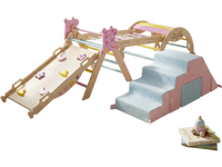 Indoor play gym featuring a climbing frame, foam blocks, and slide, designed for toddlers' active play and creativity.