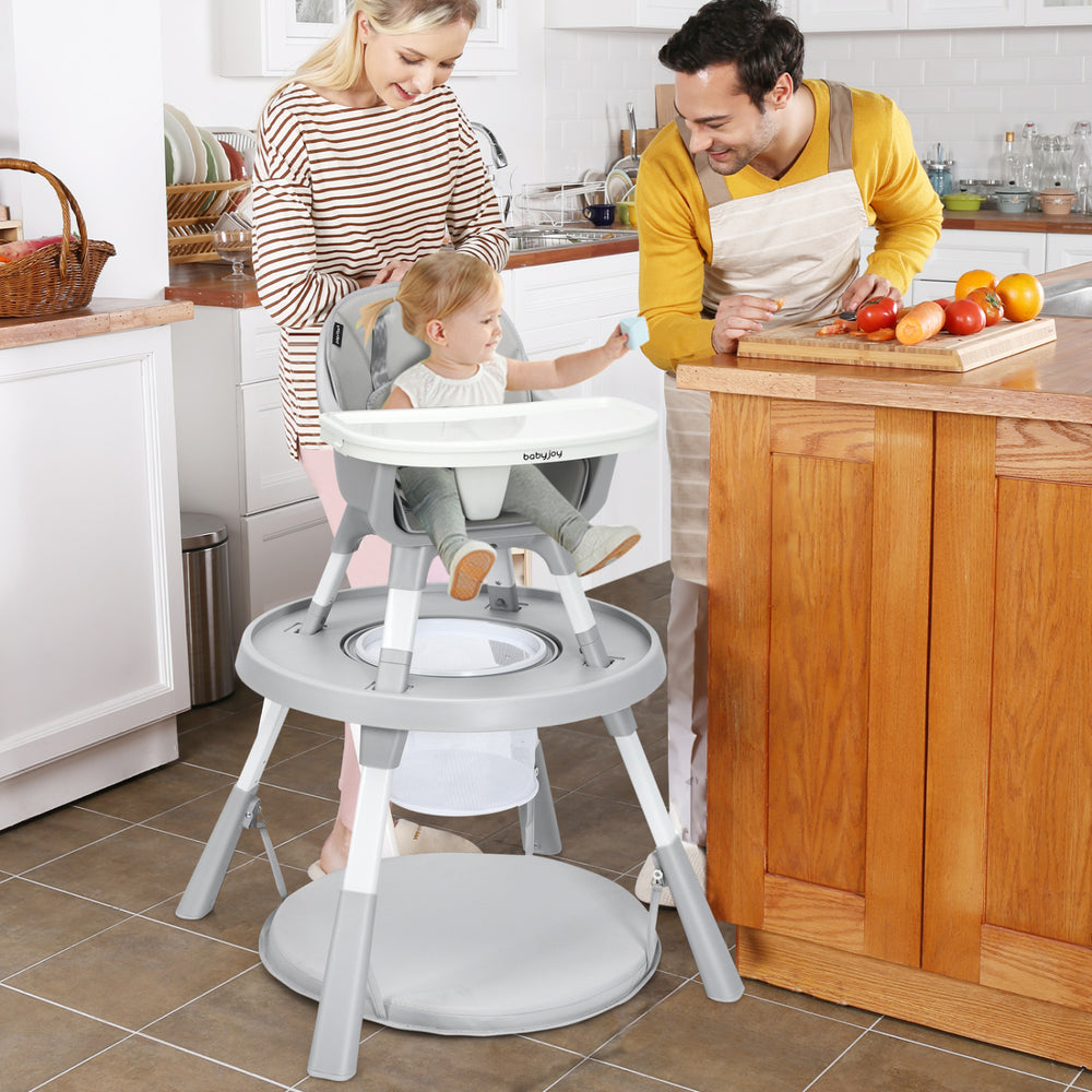 5-in-1 gray baby highchair with adjustable height, 2-tier tray storage, and safety features for versatile feeding needs.