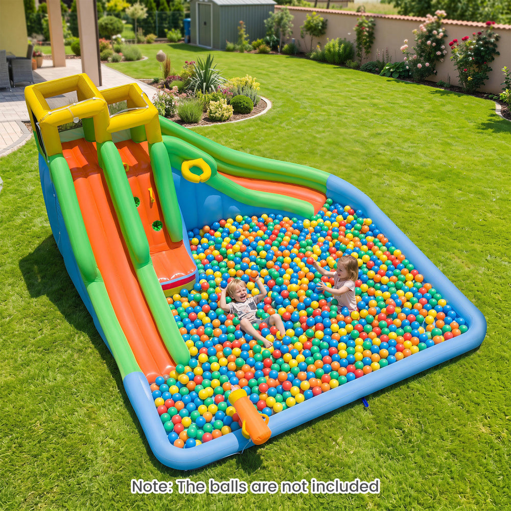 Kids play in an inflatable water slide with double slides, splash pool, and vibrant ball pit for exciting backyard fun.