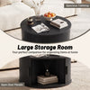Round black coffee table with large storage room and sliding tambour door, perfect for organizing items in your living room.