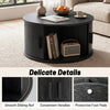 Round black coffee table with storage, featuring a sliding tambour door, convenient handles, and protective foot pads.