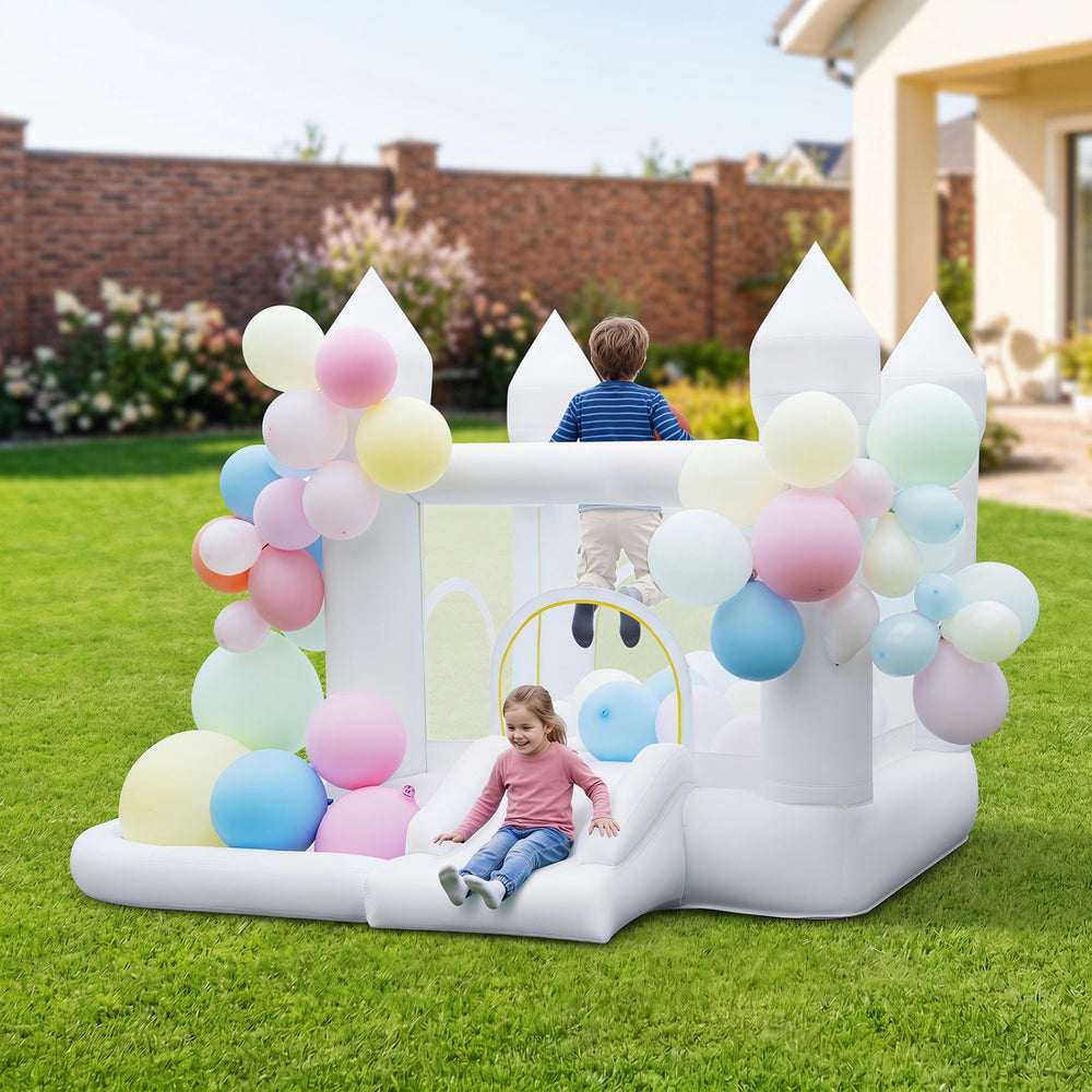Inflatable bounce house featuring a jumping area, smooth slide, and colorful balloons for outdoor party fun.