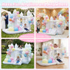 Inflatable bounce house with colorful balloons features a jumping area, slide, and basketball hoop for outdoor fun.