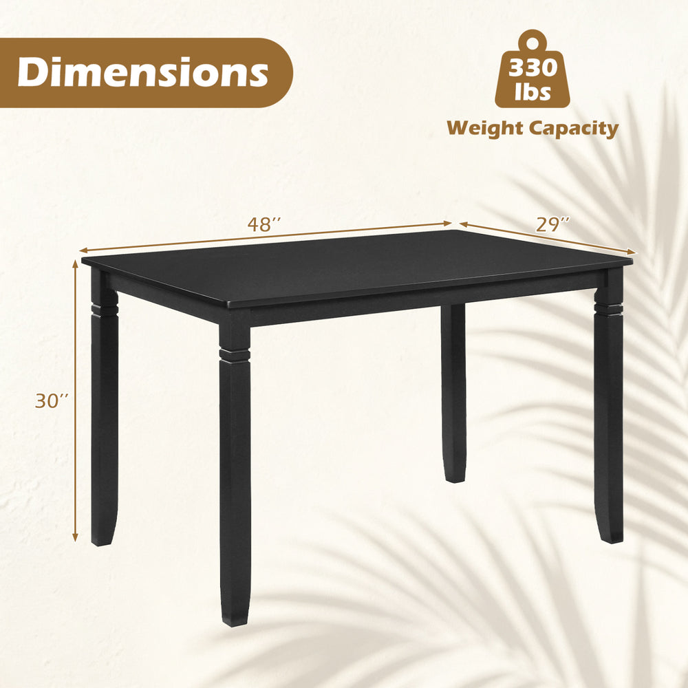 48" rectangular kitchen table in black with solid rubber wood legs, seating 4 comfortably for dining room use.