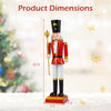 Nutcracker figurine stands 32.5 inches tall, featuring a high hat and scepter, perfect for festive holiday displays.