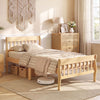 Solid wood twin size platform bed frame with slatted headboard and under-bed clearance for extra storage space.