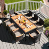 Rattan patio dining table with solid acacia wood surface, seating up to 8 people, ideal for outdoor gatherings.