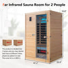 Far infrared sauna room for 2 people made of Canadian hemlock, featuring dual control panels and therapeutic heating.