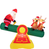 5.5 FT inflatable Christmas teeter totter shows Santa joyfully riding while illuminated by colorful built-in LED lights.