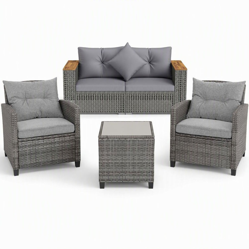 5-piece outdoor rattan sofa set with grey cushions, including a loveseat, two chairs, and a glass-top coffee table.