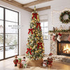 6FT Frosted Pencil Fir Christmas Tree with warm white LED lights, pine cones, and red berry clusters in a living room