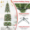 Frosted pencil fir Christmas tree with pine cones and red berries shown in a close-up of its hinged branch connection.