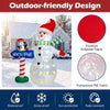 6 FT Christmas inflatable snowman, penguin and North Pole sign with colorful LED lights in a snowy yard scene.