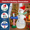 Inflatable snowman with penguin and North Pole guidepost, 6 FT tall with colorful LED lights for festive outdoor decorating.