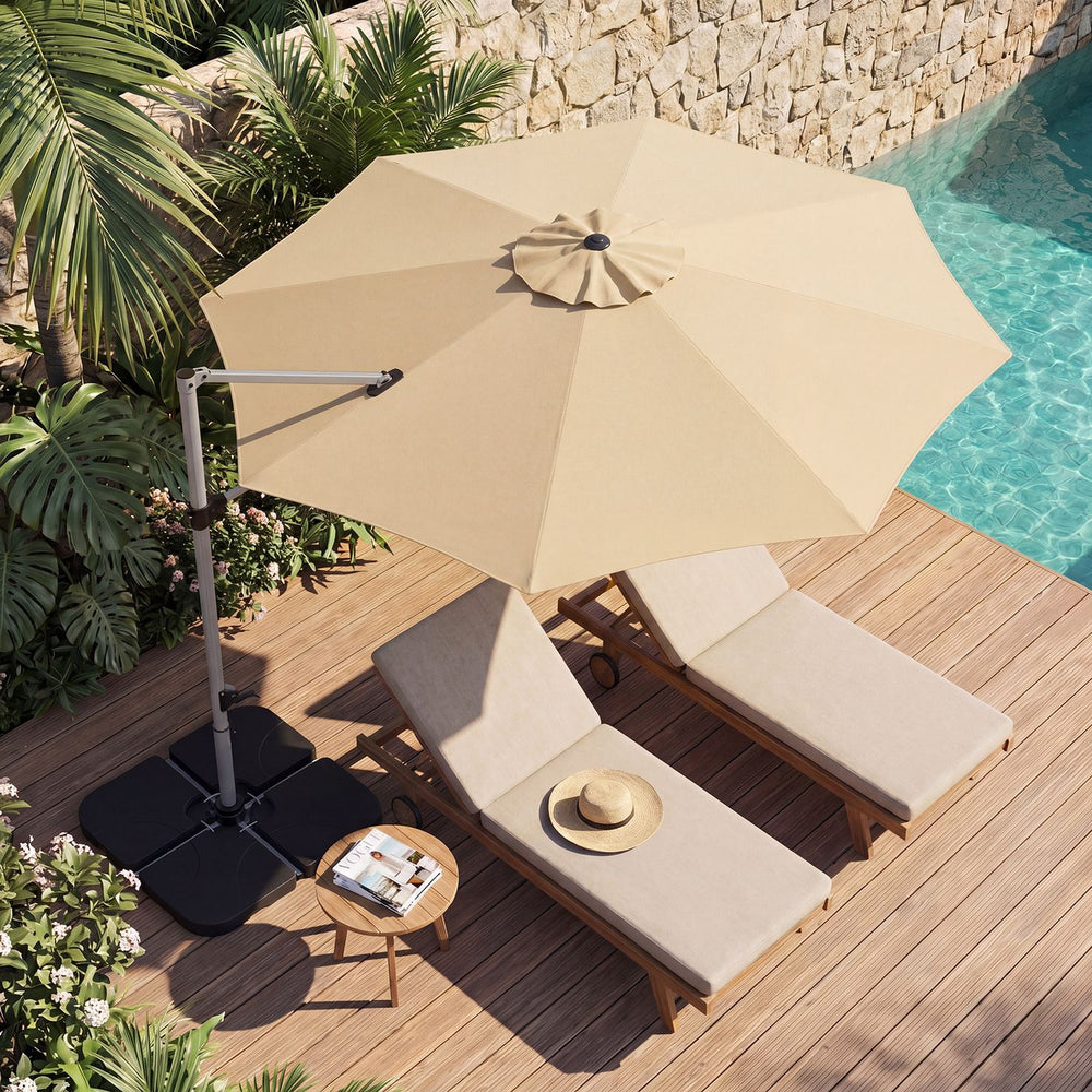 Beige 11 ft round cantilever patio umbrella with heavy-duty 4-piece base, shown open beside a pool.