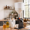 VEVOR Manual Filling Machine, 5-60 ml, 10 L Hopper, Paste Liquid Filler, for Water, Honey, Oil, Shampoo and Lotion, Anti-Drip Nozzle, Adjustable Bottle Stand, Carbon Steel Body, Effort-Saving Handle