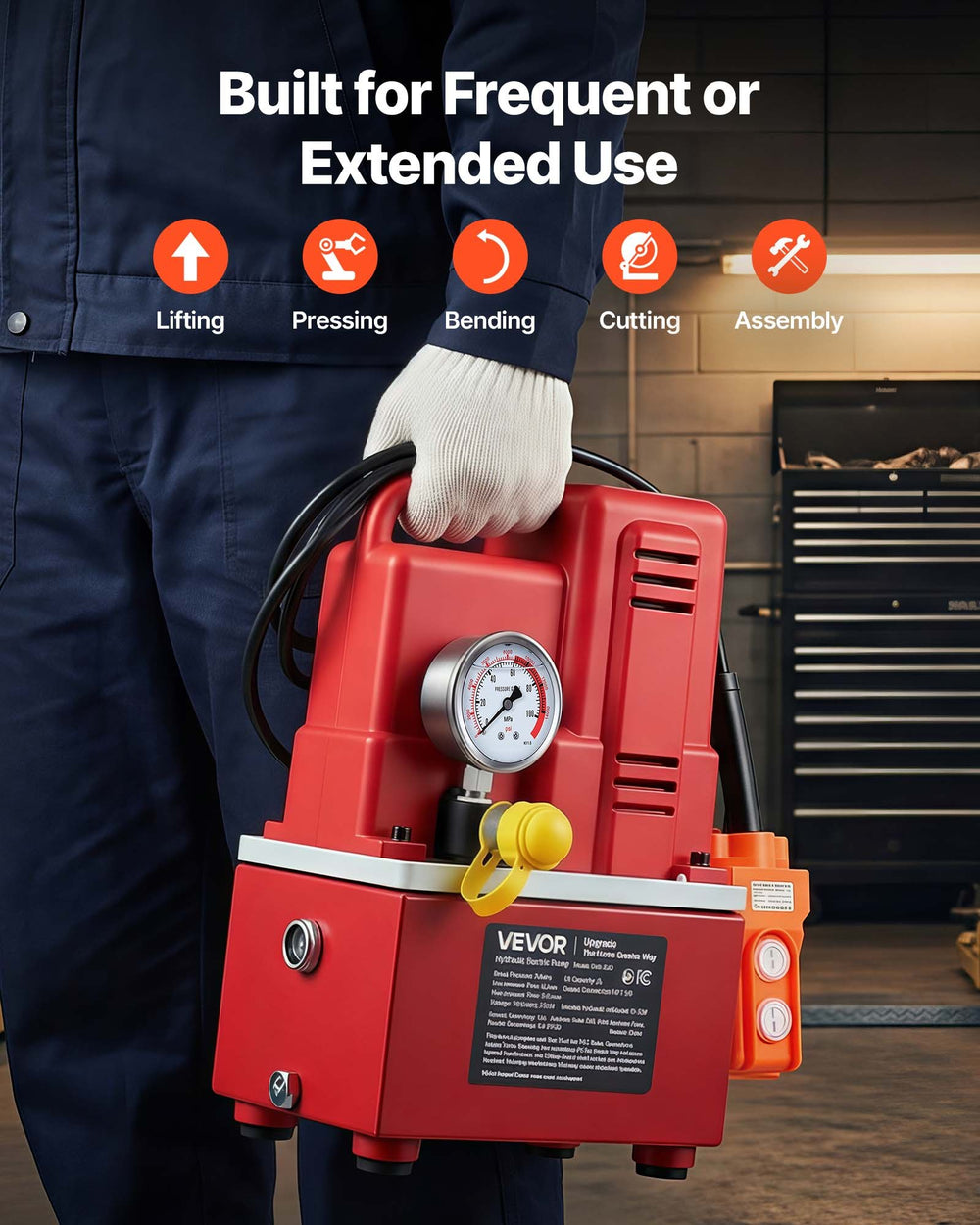 Portable hydraulic pump shown being carried for jobsite use