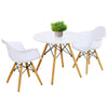 Kid's modern round table and chair set with white seats and wooden legs, perfect for play and activities.