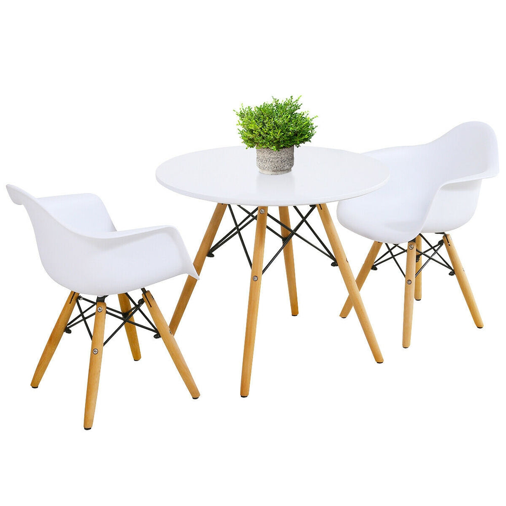 Kid's modern round table and chair set with white seats and wooden legs, perfect for play and activities.