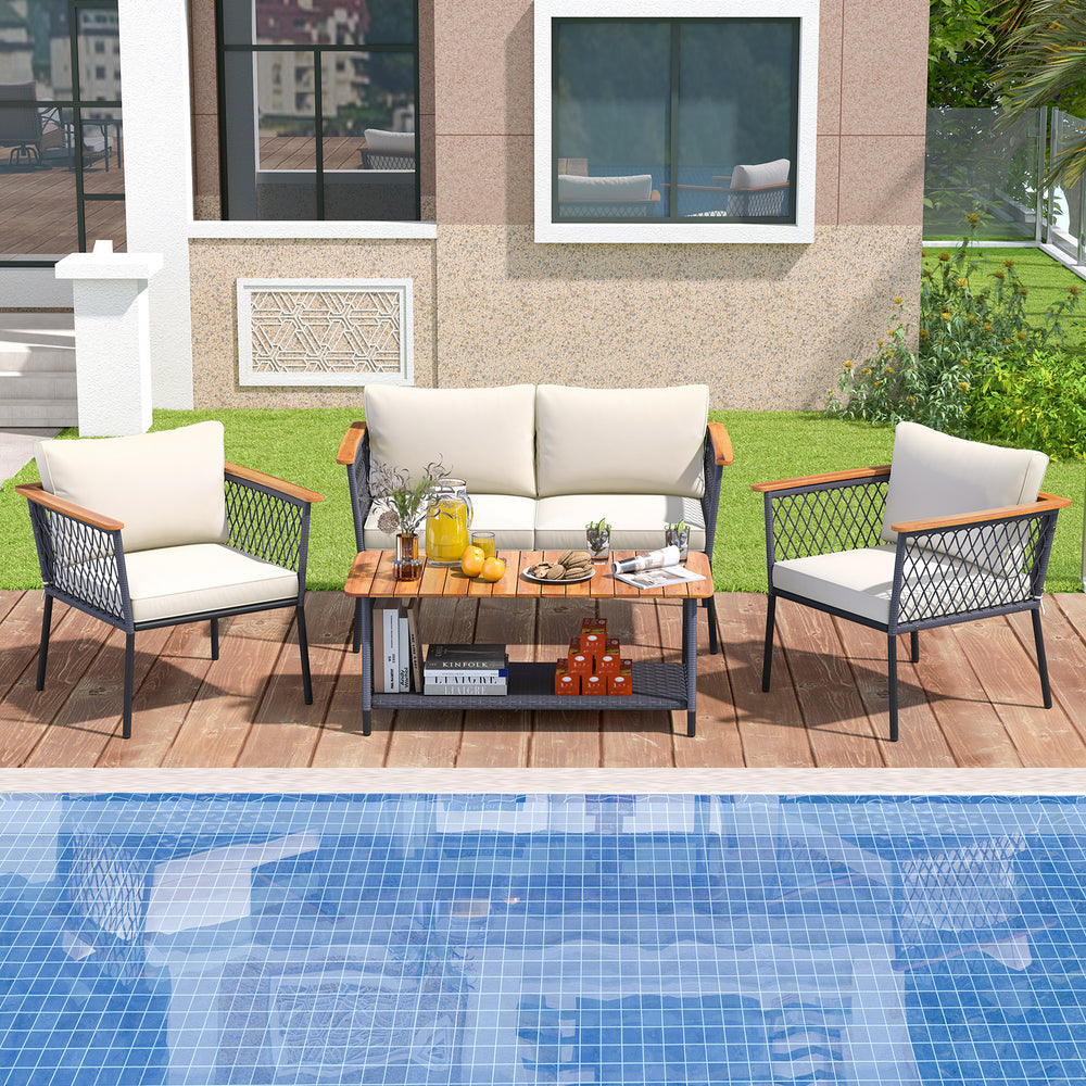 4-piece patio rattan furniture set with white cushions and a 2-tier coffee table, perfect for outdoor relaxation.