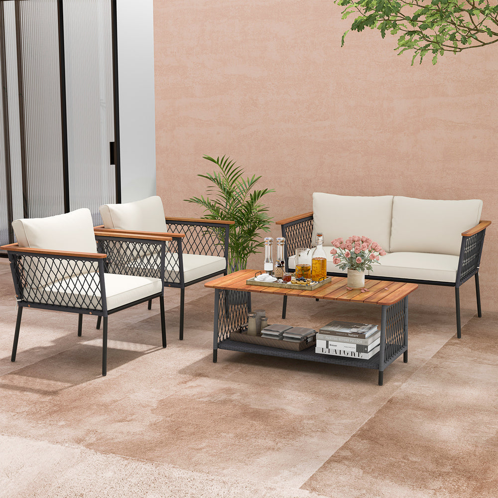4-piece patio rattan furniture set with white cushions, featuring a 2-tier coffee table and sturdy metal legs for.
