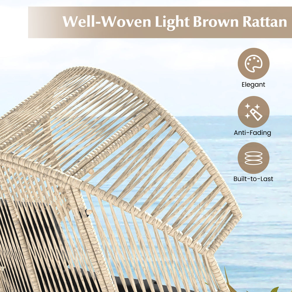 Well-woven light brown rattan oversized egg chair with cushions, ergonomic design for backyard or poolside relaxation.