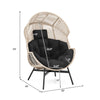 Oversized wicker egg chair with black cushions and headrest, featuring ergonomic design and heavy-duty metal base.