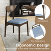 Wooden dining chair with curved back and wide padded seat, crafted from rubber wood for comfort and durability.